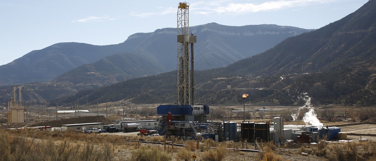 A WPX Energy natural gas drilling rig north of Parachute, Colorado, December 9, 2014. The economy of Parachute, with a current population of approximately 1000 people, was devastated when thousands of workers lost their jobs on "Black Sunday" in 1982, after Exxon terminated the Colony Shale Oil Project. The current rise of hydraulic fracking in natural gas retrieval has given a cautious hope to the town's inhabitants, who know market demand and price can effect their local economy. (Reuters/Jim Urquhart) 