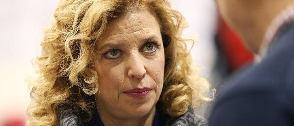 Representative Debbie Wasserman Schultz (D-FL 23rd District) and chair of the Democratic National Committee (DNC) speaks to a reporter before the democratic debate on December 19, 2015 in Manchester, New Hampshire. (Photo by Andrew Burton/Getty Images)