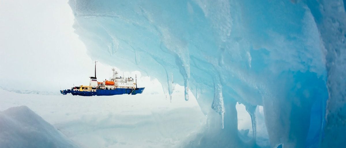 The MV Akademik Shokalskiy is pictured stranded in ice in Antarctica, December 29, 2013. An Antarctic blizzard has halted an Australian icebreaker
