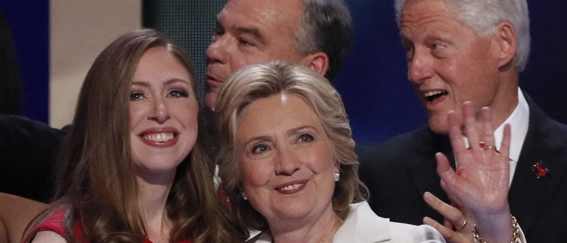 Democratic presidential nominee Hillary Clinton stands with her daughter Chelsea (L), vice presidential running mate Senator Tim Kaine (C, rear) and her husband former President Bill Clinton after accepting the nomination on the final day of the Democratic National Convention in Philadelphia, Pennsylvania, U.S. July 28, 2016. REUTERS/Mike Segar 