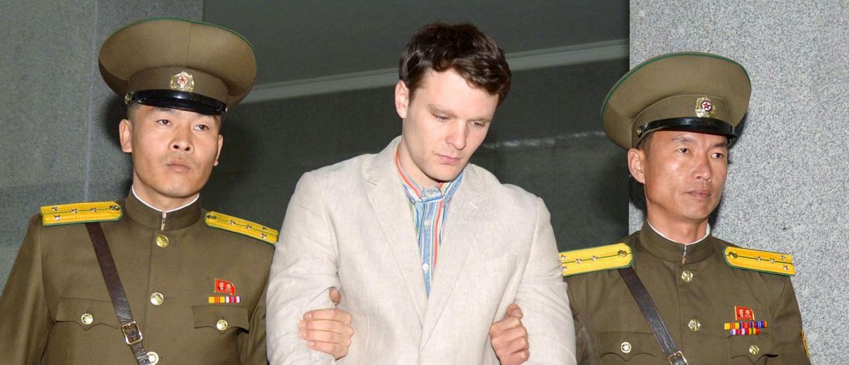 Otto Frederick Warmbier (C), a University of Virginia student who was detained in North Korea since early January, is taken to North Korea's top court in Pyongyang, North Korea, in this photo released by Kyodo March 16, 2016. North Korea's supreme court sentenced American student Warmbier, who was arrested while visiting the country, to 15 years of hard labour for crimes against the state, China's Xinhua news agency reported on Wednesday. Mandatory credit REUTERS/Kyodo