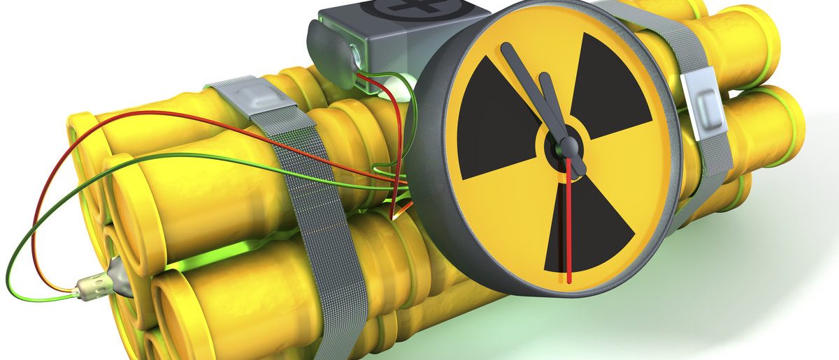 Nuclear time bomb with a light green glow, 3d rendering on white background, isolated with shadow

(Shutterstock/imagineerinx)