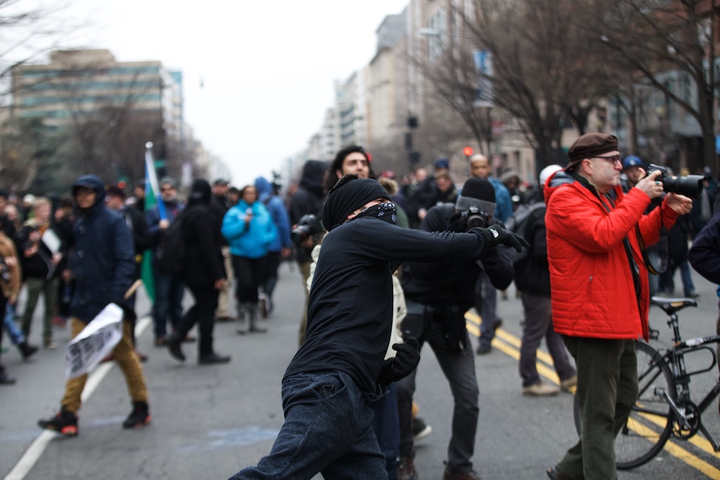 Bricks being thrown at police by protesters - Daily Caller - Grae Stafford