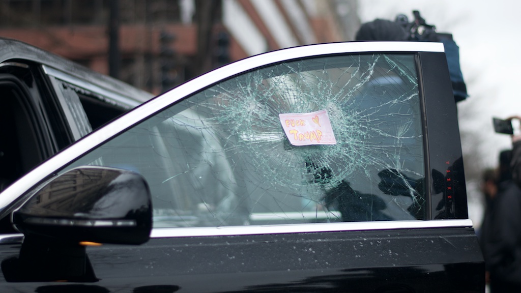 Limousine window smashed by protestors - Daily Caller - Abbey Jaroma