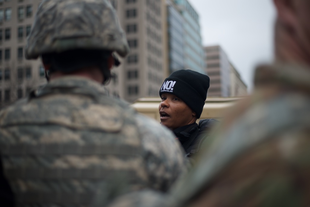 Protester speaks to a National Guard soldier on a security line - Daily Caller - Abbey Jaroma