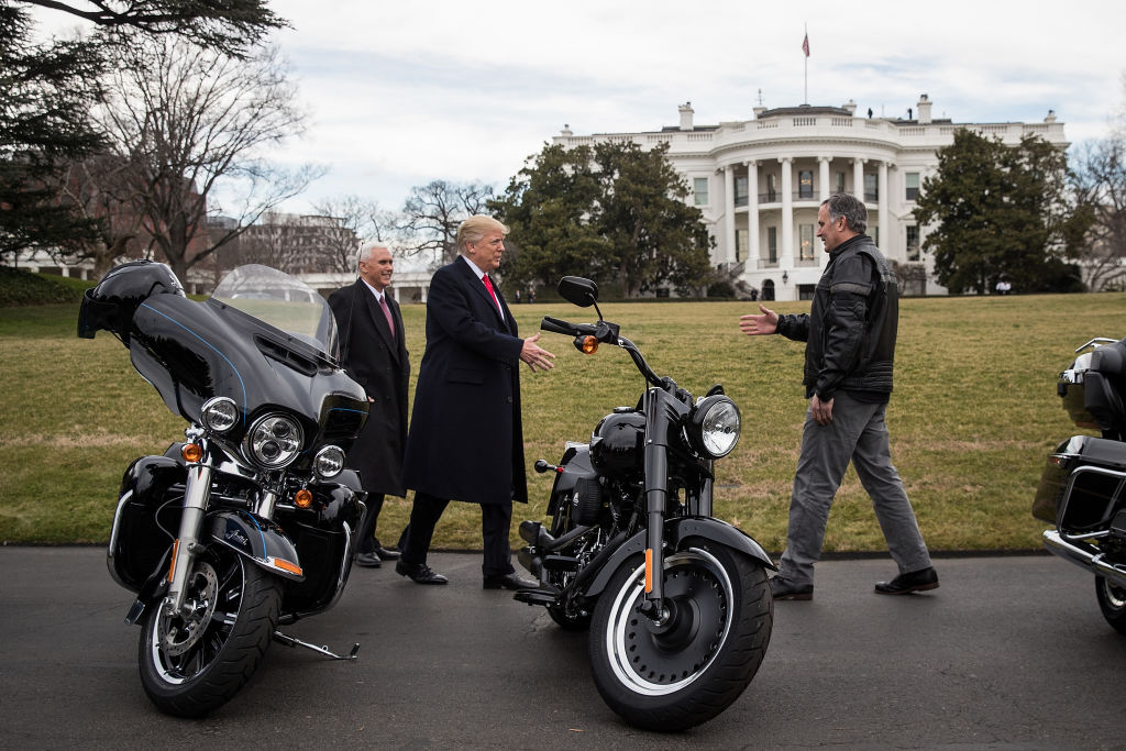 WASHINGTON, DC - FEBRUARY 2: (L to R) Vice President Mike Pence and President Donald Trump greet Harley Davidson Chief Executive Officer Matthew Levatich on the South Lawn of the White House, February 2, 2017 in Washington, DC. President Trump is meeting with Harley Davidson executives on Thursday afternoon. (Photo by Drew Angerer/Getty Images)