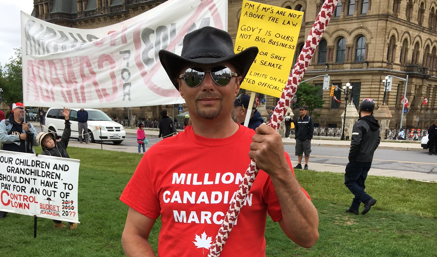 Million Canadian Deplorables March organizer Mike Wain stands in front of Canada's Parliament Hill. Daily Caller photo