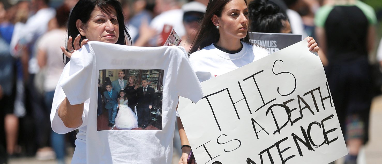 Chaldean-Americans protest against the seizure of family members Sunday by Immigration and Customs Enforcement agents during a rally outside the Mother of God Chaldean church in Southfield, Michigan, U.S., June 12, 2017. (PHOTO: REUTERS/Rebecca Cook)