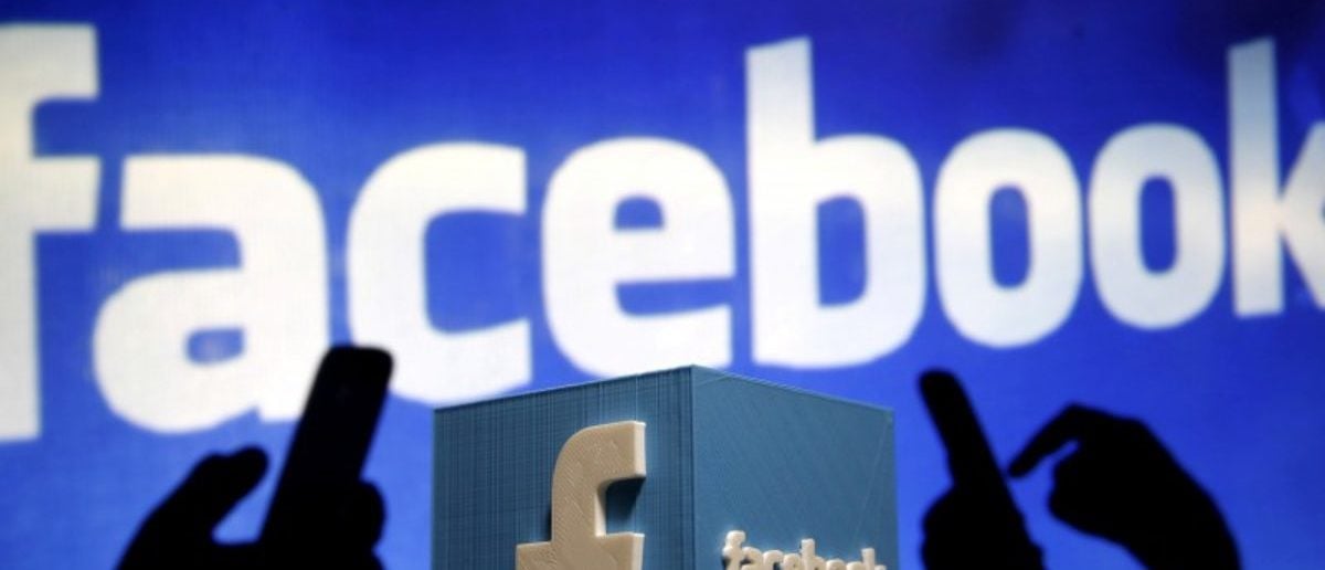 FILE PHOTO: A 3D plastic representation of the Facebook logo is seen in this photo illustration May 13, 2015. REUTERS/Dado Ruvic/Illustration/File Photo