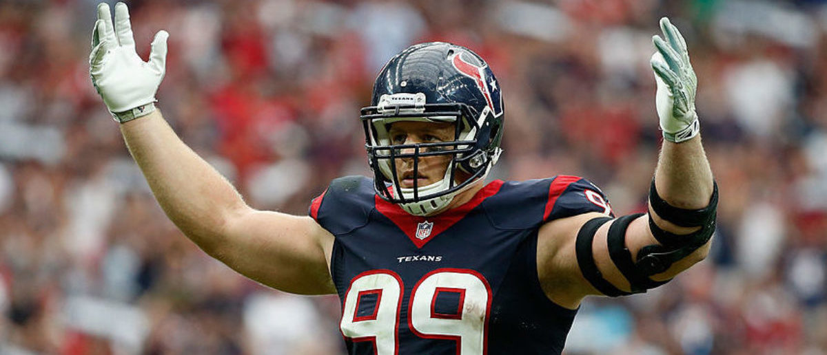 HOUSTON, TX - SEPTEMBER 28:   J.J. Watt #99 of the Houston Texans pumps up the crowd in the fourth quarter of their game against the Buffalo Bills at NRG Stadium on September 28, 2014 in Houston, Texas.  (Photo by Scott Halleran/Getty Images)