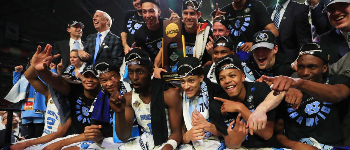 GLENDALE, AZ - APRIL 03:  The North Carolina Tar Heels celebrate after defeating the Gonzaga Bulldogs during the 2017 NCAA Men's Final Four National Championship game at University of Phoenix Stadium on April 3, 2017 in Glendale, Arizona. The Tar Heels defeated the Bulldogs 71-65.  (Photo by Ronald Martinez/Getty Images)