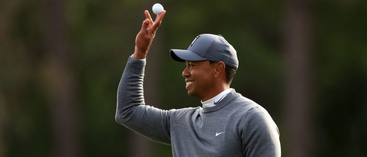 Tiger Woods reacts after playing his shot plays rom the 17th tee during the first round of the Valspar Championship at Innisbrook Resort Copperhead Course on March 8, 2018 in Palm Harbor, Florida.  (Photo by Sam Greenwood/Getty Images)