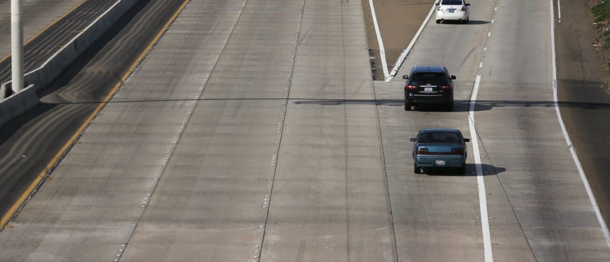 The lack of painted freeway lane markers is seen on Interstate highway 5 in San Diego, California February 10, 2016. Picture taken February 10. To match Insight AUTOS-AUTONOMOUS/INFRASTRUCTURE     REUTERS/Mike Blake | Immigrants Injured In Car Crash