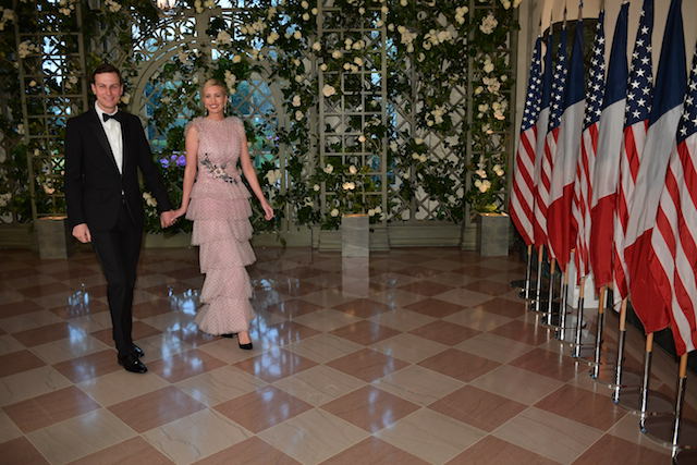 Ivanka Trump and husband Jared Kushner, Trump's senior advisor arrive in the Booksellers Area of the White House to attend a state dinner honoring French President Emmanuel Macron on April 24, 2018 in Washington, DC. (Photo by MANDEL NGAN / AFP) (Photo credit should read MANDEL NGAN/AFP/Getty Images)