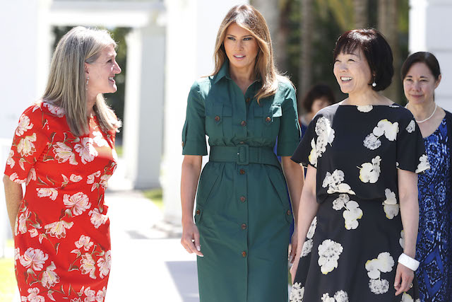US First Lady Melania Trump (C) and Akie Abe, wife of Japanese Prime Minister Shinzo Abe (R), are greeted by museum director Erin Manning (L) as they enter the Flagler Museum in Palm Beach, Florida April 18, 2018. / AFP PHOTO / RHONA WISE (Photo credit should read RHONA WISE/AFP/Getty Images)