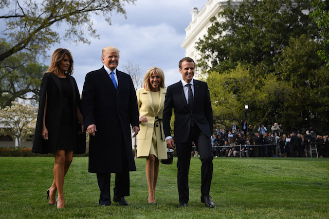US President Donald Trump and First Lady Melania Trump, and French President Emmanuel Macron and his wife, Brigitte Macron walk outside the White House April 23, 2018 in Washington,DC. (Photo by JIM WATSON / AFP) (Photo credit should read JIM WATSON/AFP/Getty Images)