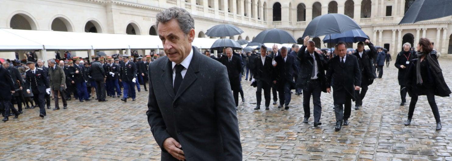 Former French President Nicolas Sarkozy leaves after a national ceremony for late Lieutenant-Colonel Arnaud Beltrame at the Hotel des Invalides in Paris, France, March 28, 2018. Beltrame was killed by an Islamist militant after taking the place of a female hostage during a supermarket siege in Trebes.   Ludovic Marin/Pool via Reuters | French Leaders Decry Islamic Antisemtism