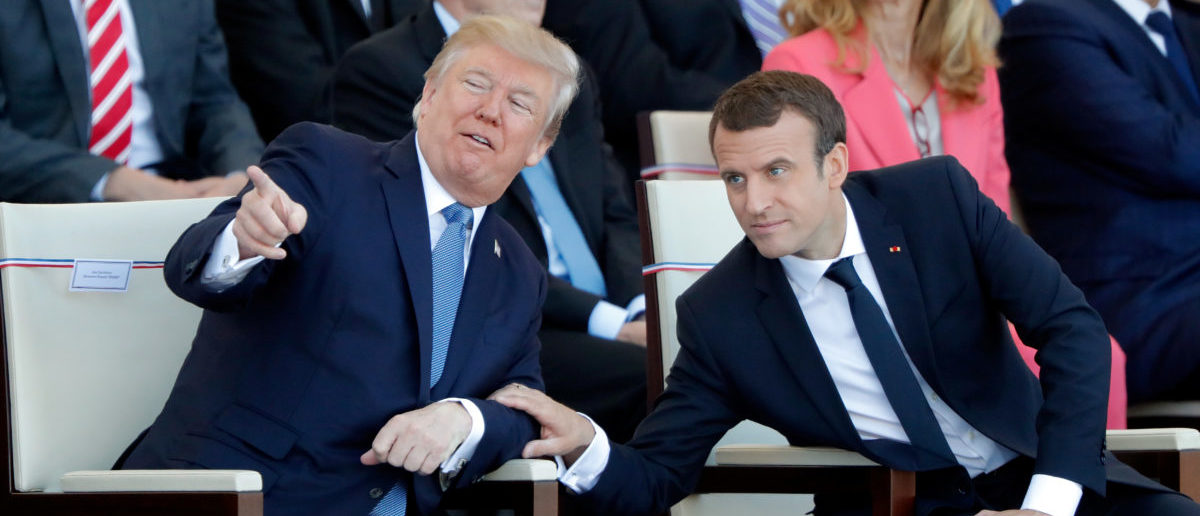 French President Emmanuel Macron and U.S. President Donald Trump attend the traditional Bastille Day military parade on the Champs-Elysees in Paris, France, July 14, 2017. REUTERS/Charles Platiau