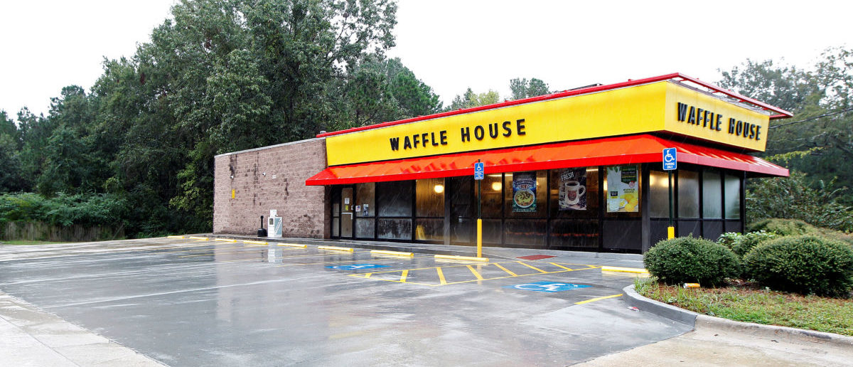 A closed Waffle House restaurant with a deserted parking lot is seen in Savannah, Georgia, U.S., October 7, 2016. The Waffle House Index is an informal way for Federal Emergency Management Agency (FEMA) to determine which areas are deemed to have more disastrous results and require recovery after a storm as all Waffle Houses stay open 24 hours, 365 days a year. REUTERS/Tami Chappell