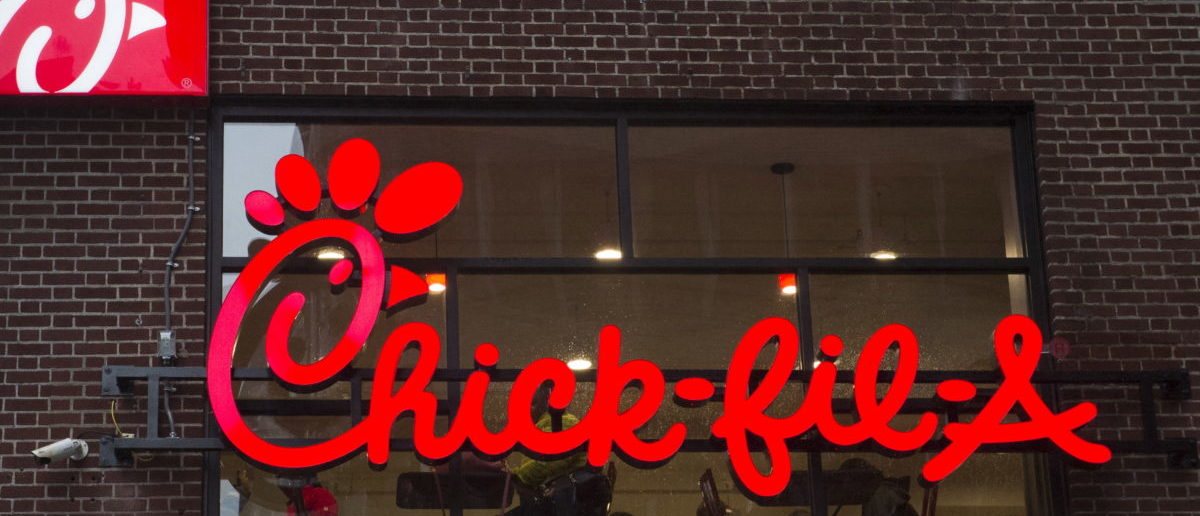 A franchise sign is seen above a Chick-fil-A freestanding restaurant after its grand opening in Midtown, New York October 3, 2015.  REUTERS/Rashid Umar Abbasi 