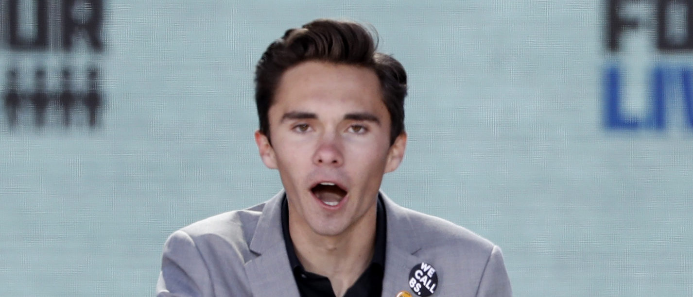 David Hogg, a student at the Marjory Stoneman Douglas High School, site of a February mass shooting which left 17 people dead in Parkland, Florida, speaks as students and gun control advocates hold the "March for Our Lives" event demanding gun control after recent school shootings at a rally in Washington, U.S., March 24, 2018. REUTERS/Aaron P. Bernstein 