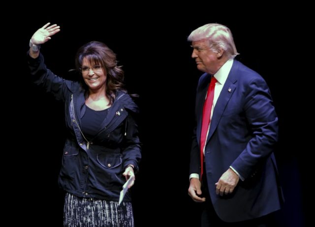 Former Alaska Governor Sarah Palin (L), introduces Republican U.S. presidential candidate Donald Trump during a Town Hall at the Racine Civic Centre Memorial Hall, April 2, 2016. REUTERS/Kamil Krzaczynski TPX IMAGES OF THE DAY