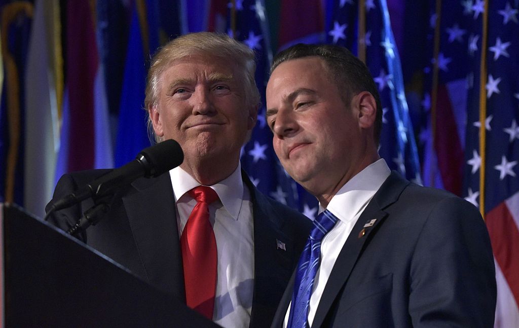 Reince Priebus hugs Donald Trump during an election night event at the New York Hilton Midtown (Getty Images)