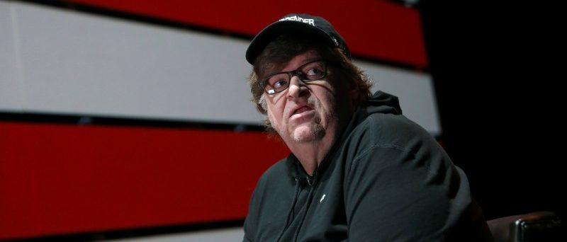 Michael Moore looks off stage during an interview at the site of his one-man Broadway show at the Belasco Theatre in Manhattan, New York, U.S., August 17, 2017. REUTERS/Shannon Stapleton