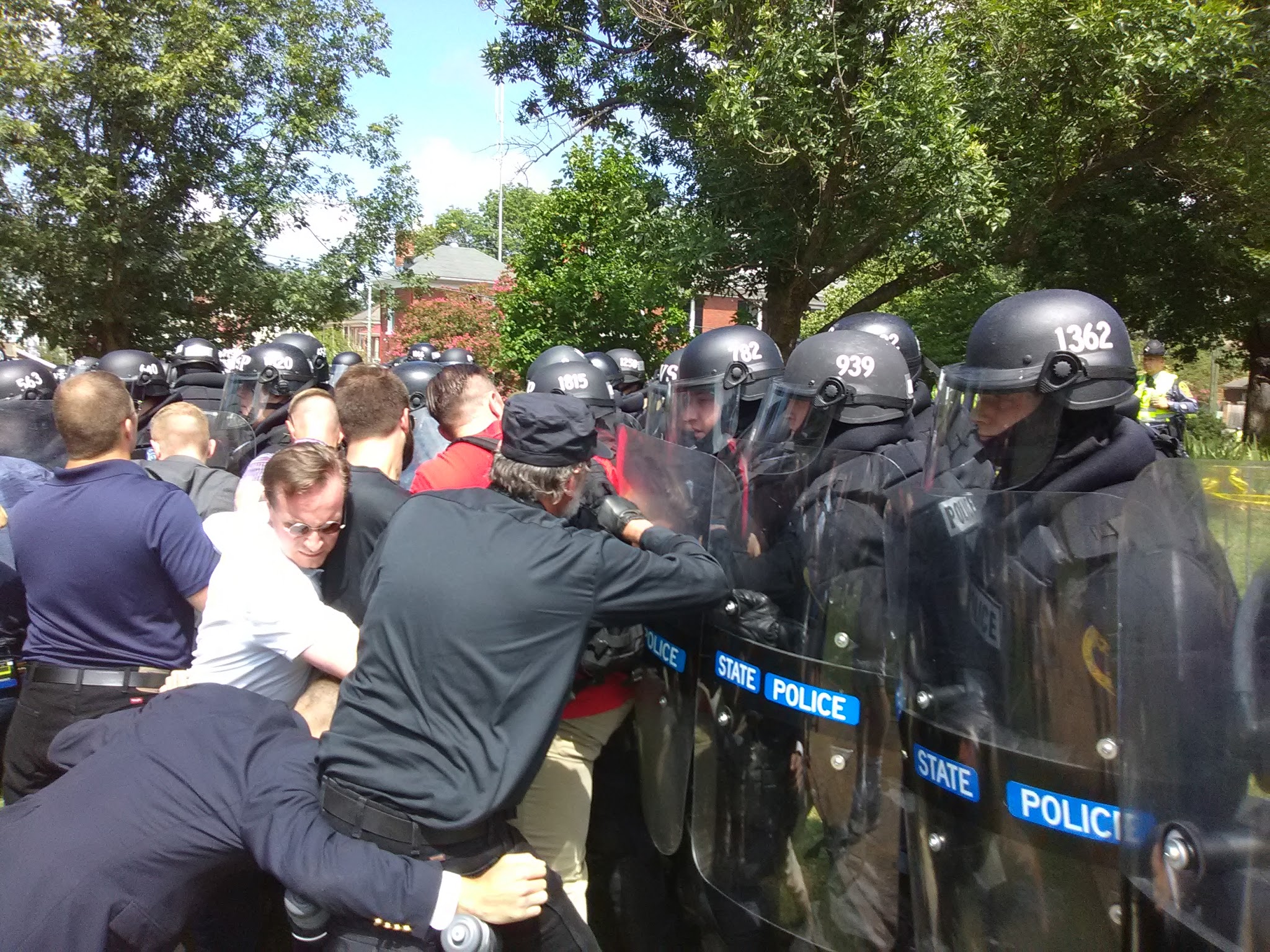 Members of the white supremacist movement push back against police in Charlottesville (Ted Goodman, TheDCNF)