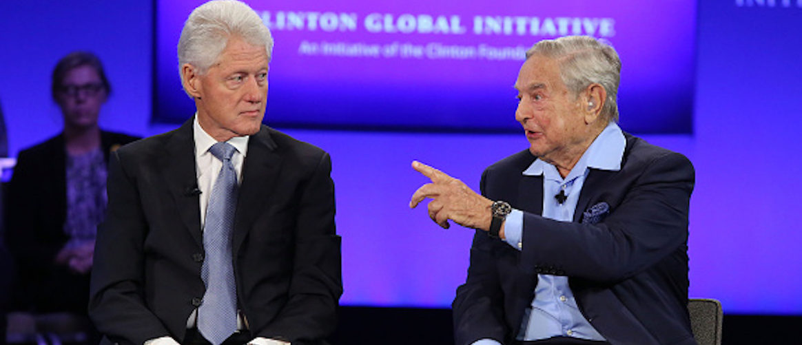 NEW YORK, NY - SEPTEMBER 27: President Bill Clinton and George Soros speak during the 2015 Clinton Global Initiative Annual Meeting at Sheraton Times Square on September 27, 2015 in New York City. (Photo by Taylor Hill/FilmMagic)