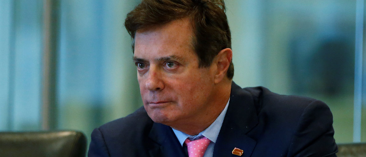 Paul Manafort of Republican presidential nominee Donald Trump's staff listens during a round table discussion on security at Trump Tower in the Manhattan borough of New York, U.S., August 17, 2016. Picture taken August 17, 2016. REUTERS/Carlo Allegri - S1AETWIWWYAA