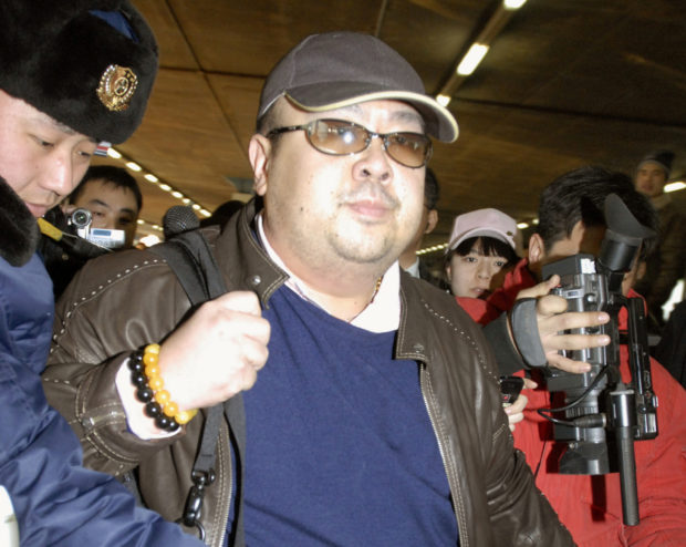 Kim Jong Nam arrives at Beijing airport in Beijing, China, in this photo taken by Kyodo February 11, 2007. Picture taken February 11, 2007. Mandatory credit Kyodo/via REUTERS