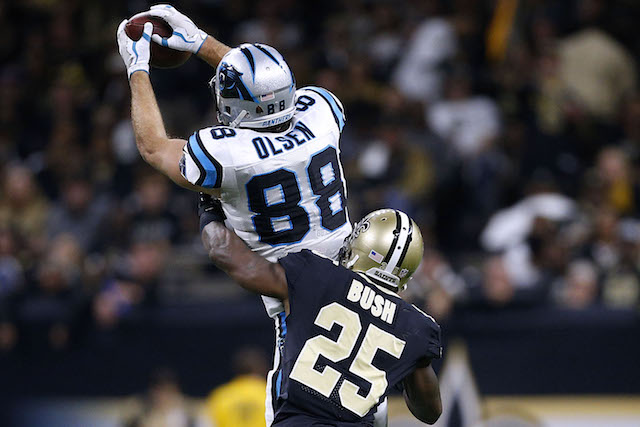 NEW ORLEANS, LA - JANUARY 07: Greg Olsen #88 of the Carolina Panthers catches the ball as Rafael Bush #25 of the New Orleans Saints defends during the second half of the NFC Wild Card playoff game at the Mercedes-Benz Superdome on January 7, 2018 in New Orleans, Louisiana. (Photo by Jonathan Bachman/Getty Images)