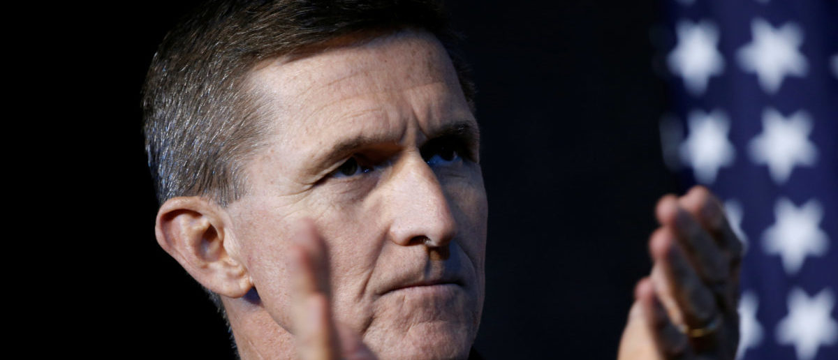 Retired U.S. Army Lieutenant General Michael Flynn reacts at a campaign event for then Republican presidential nominee Donald Trump in Herndon, Virginia, U.S., October 3, 2016. Picture taken October 3, 2016. REUTERS/Mike Segar