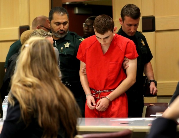 Nikolas Cruz, facing 17 charges of premeditated murder in the mass shooting at Marjory Stoneman Douglas High School in Parkland, appears in court for a status hearing before Broward Circuit Judge Elizabeth Scherer in Fort Lauderdale, Florida, U.S. February 19, 2018. REUTERS/Mike Stocker/Pool