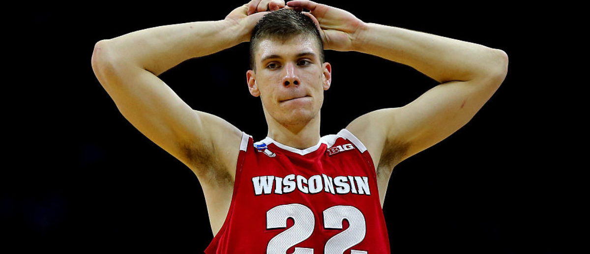 PHILADELPHIA, PA - MARCH 25:  Ethan Happ #22 of the Wisconsin Badgers reacts after fouling out in the second half against the Notre Dame Fighting Irish during the 2016 NCAA Men's Basketball Tournament East Regional at Wells Fargo Center on March 25, 2016 in Philadelphia, Pennsylvania.  (Photo by Elsa/Getty Images)