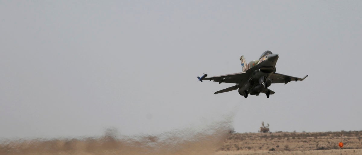An Israeli F-16 fighter jet takes off at Ramon air base in southern Israel during routine training, October 21, 2013. REUTERS/Amir Cohen