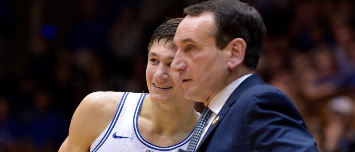DURHAM, NC - FEBRUARY 14:  Grayson Allen #3 talks to head coach Mike Krzyzewski of the Duke Blue Devils during their game against the Virginia Tech Hokies at Cameron Indoor Stadium on February 14, 2018 in Durham, North Carolina. Duke won 74-52.  (Photo by Grant Halverson/Getty Images)