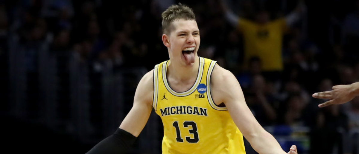 LOS ANGELES, CA - MARCH 22:  Moritz Wagner #13 of the Michigan Wolverines celebrates after Wagner makes a three-pointer in the first half against the Texas A&M Aggies in the 2018 NCAA Men's Basketball Tournament West Regional at Staples Center on March 22, 2018 in Los Angeles, California.  (Photo by Ezra Shaw/Getty Images)
