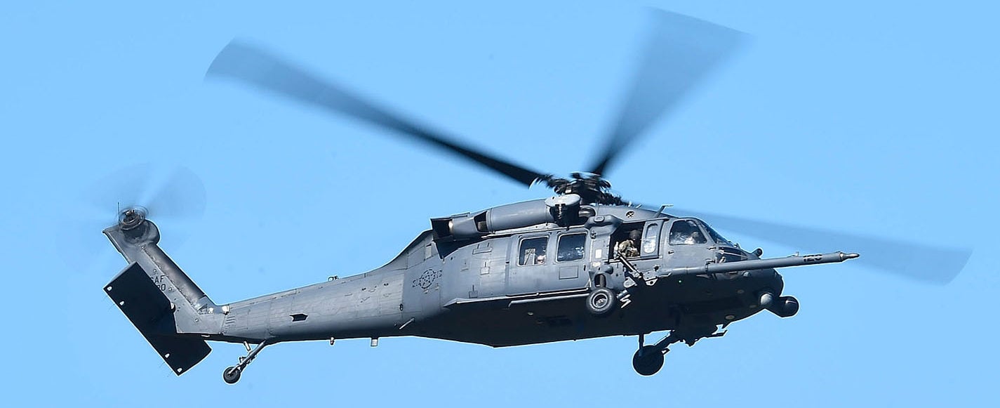 A U.S military HH-60 Pave Hawk Helicopter is seen flying over a simulated crash site during Exercise Angel Reign on July 1, 2016 in Townsville, Australia. Exercise Angel Reign is the largest Air Force led field exercise in Australia this year and is a bilateral Joint Personnel Recovery exercise which aims to practice search and rescue activities both at sea and on land. (Photo by Ian Hitchcock/Getty Images)