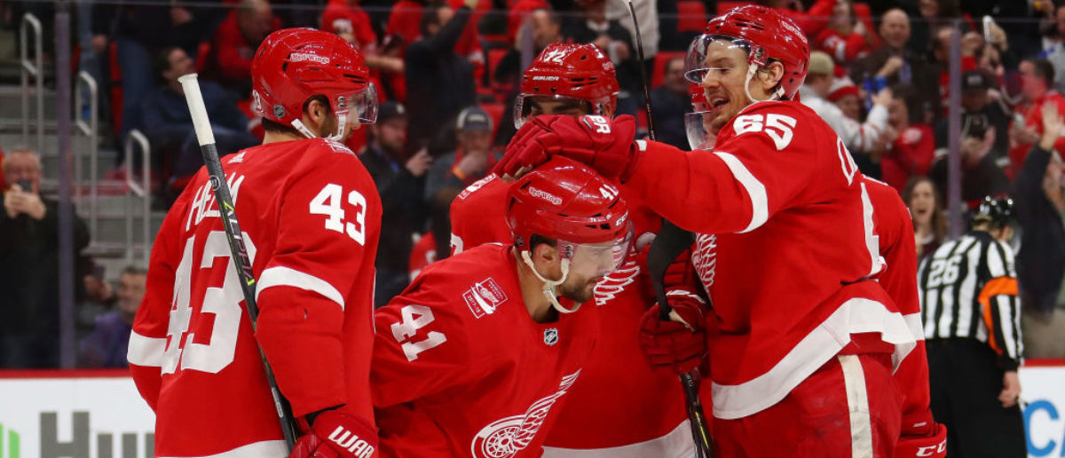 DETROIT, MI - MARCH 27: Luke Glendening #41 of the Detroit Red Wings celebrates his second period goal with teammates while playing the Pittsburgh Penguins at Little Caesars Arena on March 27, 2018 in Detroit, Michigan. (Photo by Gregory Shamus/Getty Images)