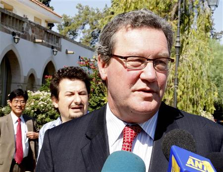 U.N. Special Adviser for Cyprus, Alexander Downer, speaks to the media after talks with Cypriot President Dimitris Christofias in Nicosia July 29, 2008. REUTERS/Andreas Manolis
