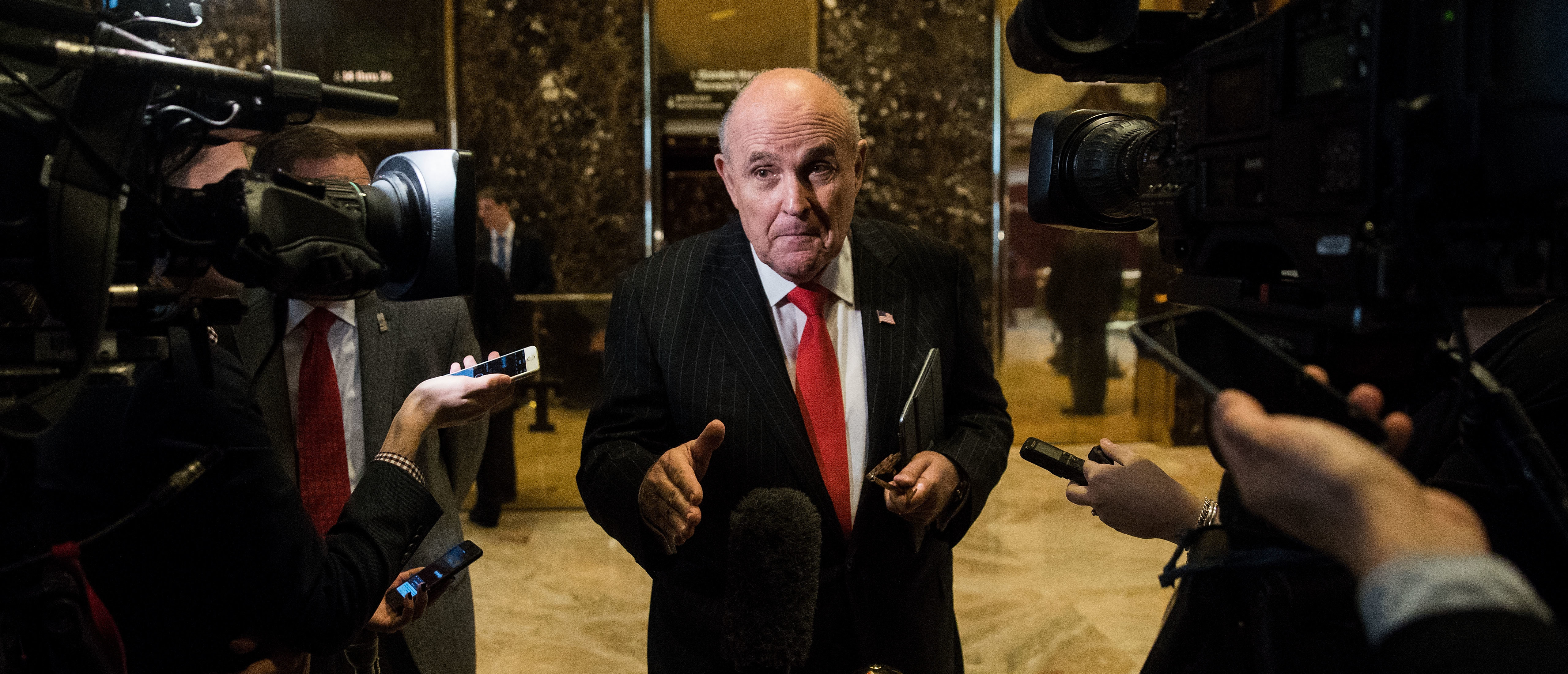 NEW YORK, NY - JANUARY 12: Former New York City Mayor Rudy Giuliani speaks to reporters at Trump Tower, January 12, 2017 in New York City. President-elect Trump continues to hold meetings Trump Tower. (Photo by Drew Angerer/Getty Images)