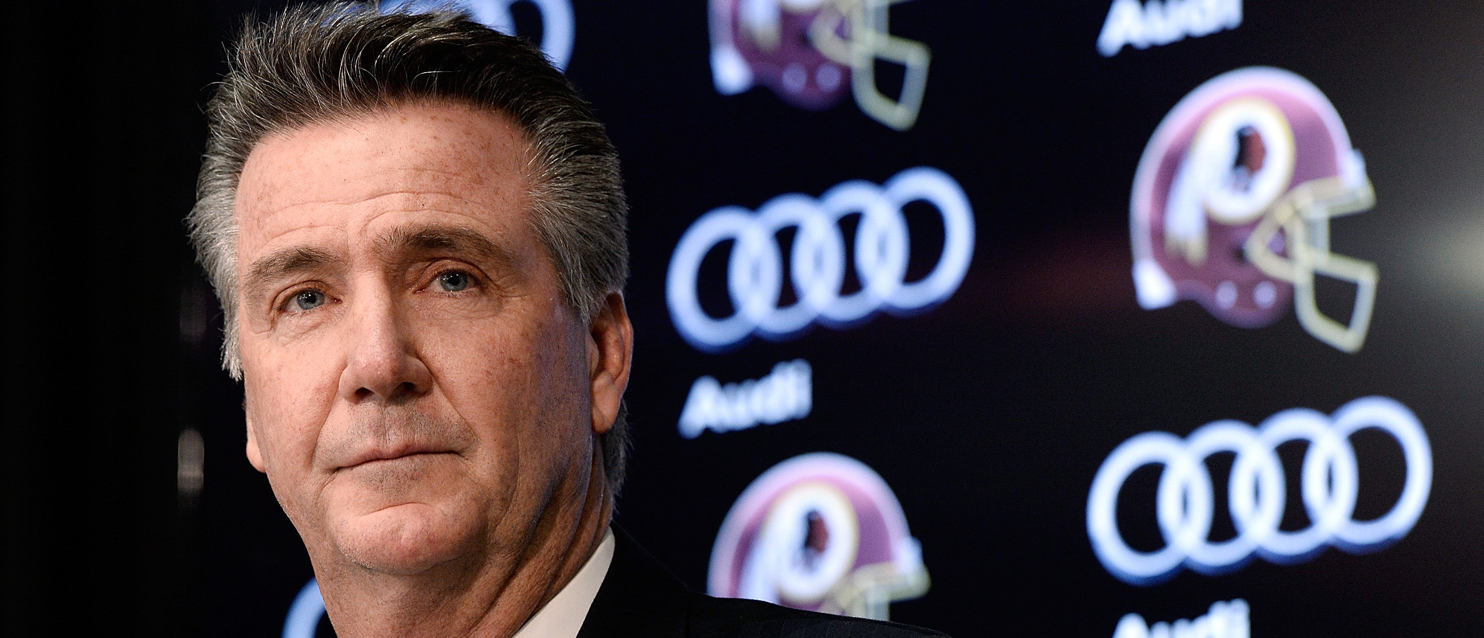 ASHBURN, VA - JANUARY 09:  Washington Redskins Executive Vice President and General Manager Bruce Allen speaks as Jay Gruden is introduced as the new head coach of the Washington Redskins at a press conference at Redskins Park on January 9, 2014 in Ashburn, Virginia.  (Photo by Patrick McDermott/Getty Images)