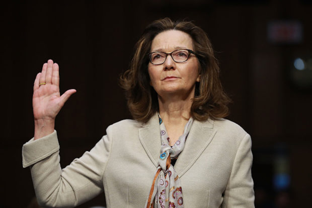 WASHINGTON, DC - MAY 09: Central Intelligence Agency Deputy Director Gina Haspel is sworn in before the Senate Intelligence Committee during her confirmation hearing to become the next CIA director in the Hart Senate Office Building May 9, 2018 in Washington, DC. If confirmed, Haspel would be the first woman to lead the nation's biggest spy agency. Haspel ran a secret 'black site' CIA prison in Thailand after September 11, 2001, where detainees were subjected to brutal interrogation techniques and she was later involved in approving the destruction of videotapes of interrogation sessions at that prison. (Photo by Chip Somodevilla/Getty Images)