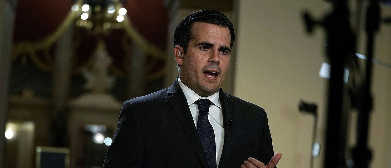 Puerto Rican Gov. Ricardo Rossello is interviewed by a TV channel after a House vote at the Capitol December 21, 2017 in Washington, DC. The House has passed a $81 billion emergency aid bill to help Texas, Florida, Puerto Rico and California to rebuild after natural disasters this year. (Photo by Alex Wong/Getty Images)