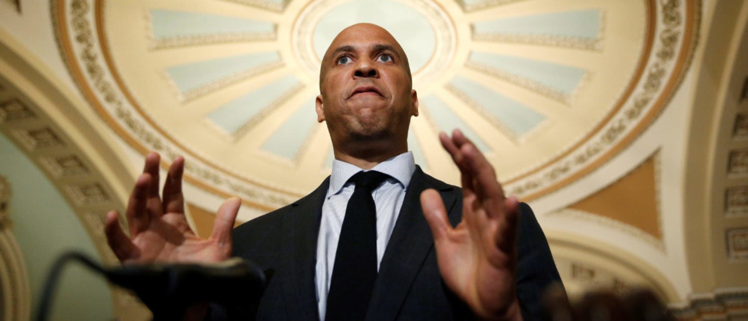 Senator Cory Booker (D-NJ) speaks after the Democratic policy lunch on Capitol Hill in Washington, U.S., July 10, 2018. REUTERS/Joshua Roberts