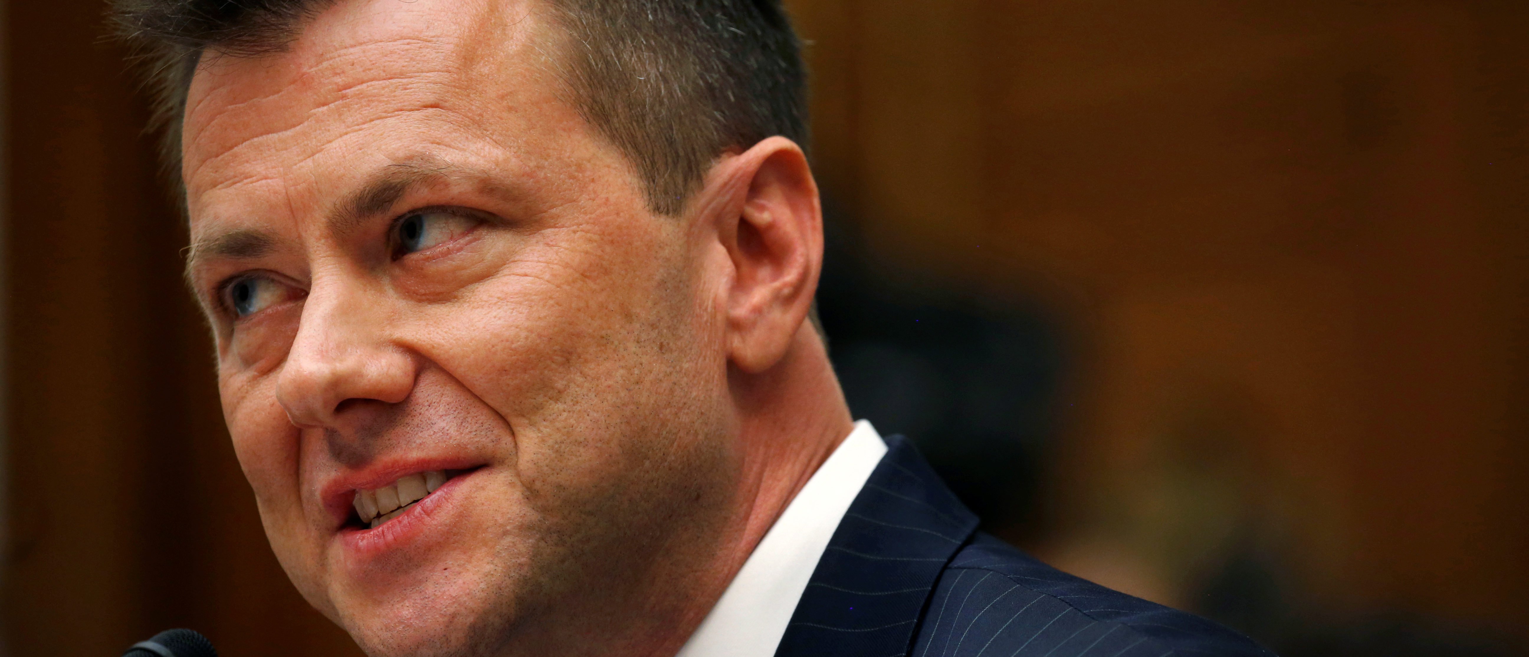 FBI Deputy Assistant Director Peter Strzok testifies before the House Committees on Judiciary and Oversight and Government Reform joint hearing on "Oversight of FBI and DOJ Actions Surrounding the 2016 Election" in the Rayburn House Office Building in Washington, U.S., July 12, 2018. REUTERS/Leah Millis - RC1653D04DE0
