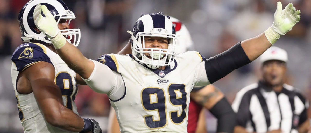 aaron donald flexes insane physique during super bowl parade