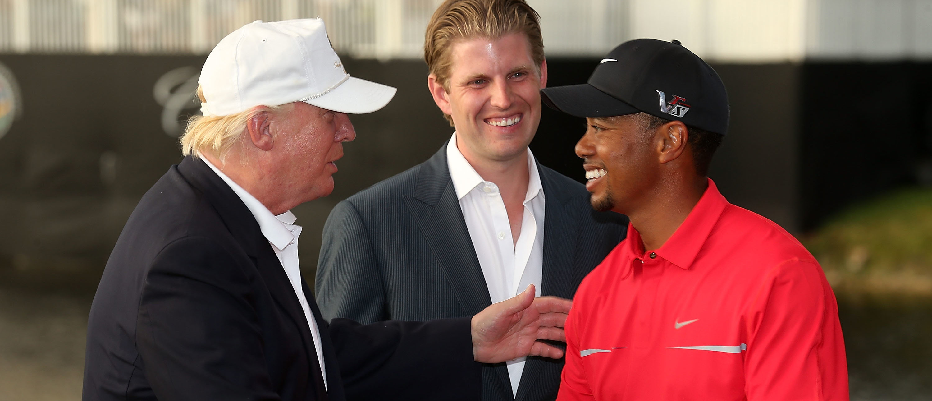 DORAL, FL - MARCH 10: Developer Donald Trump (L) greets Tiger Woods after the final round of the World Golf Championships-Cadillac Championship as Eric Trump looks on at the Trump Doral Golf Resort & Spa on March 10, 2013 in Doral, Florida. (Photo by Warren Little/Getty Images)